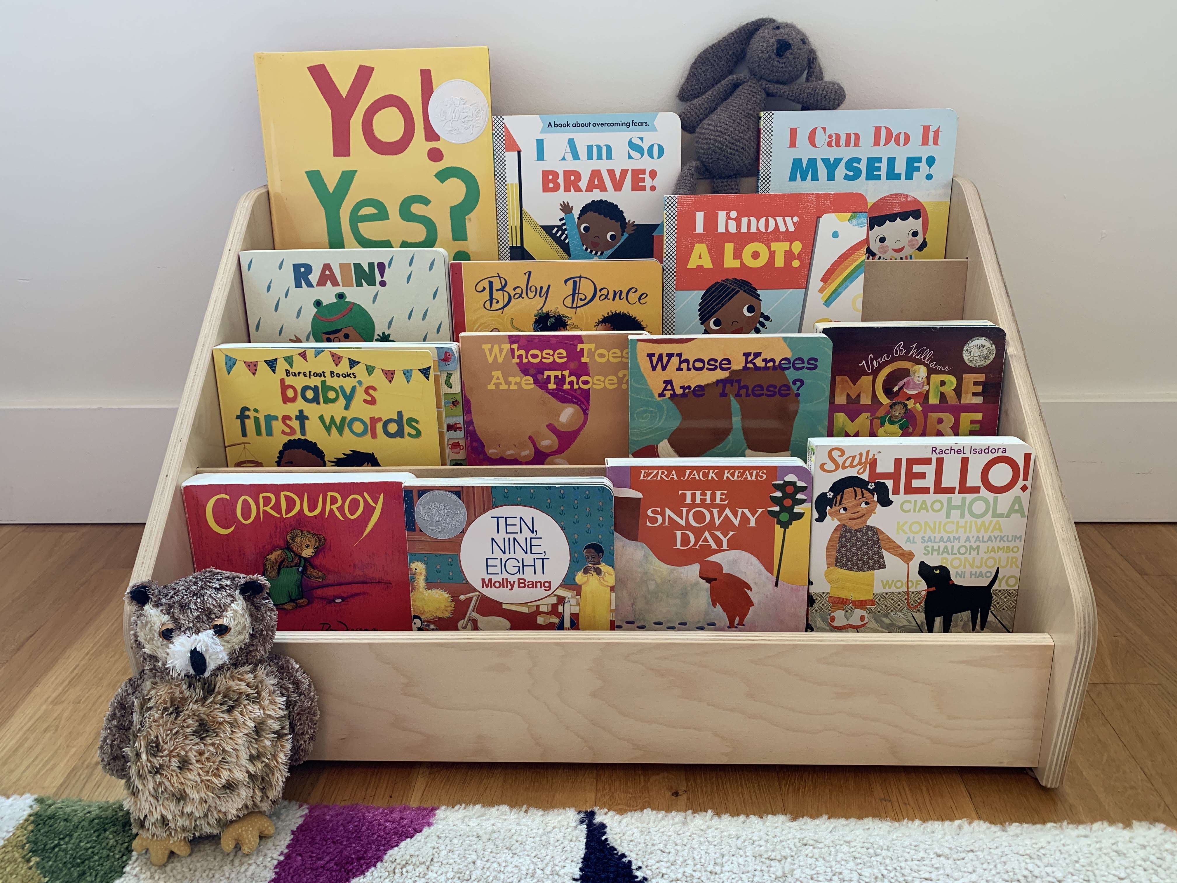 Picture of front-facing bookshelf with children's books